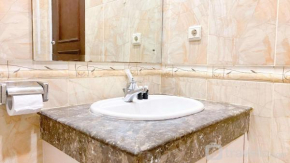 Homey and Comfort Stay 2BR Bellezza Apartment By Travelio